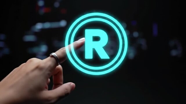 Hand touching glowing blue registered trademark symbol in digital interface