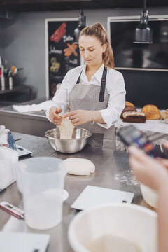 Crafting artisan bread in the heart of a bustling kitchen filled with warmth and creativity