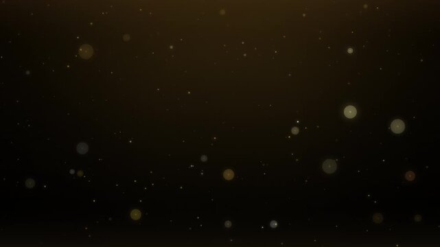 Floating golden particles and bokeh lights on a dark brown gradient background, shimmering dust effect, luxury and celebration