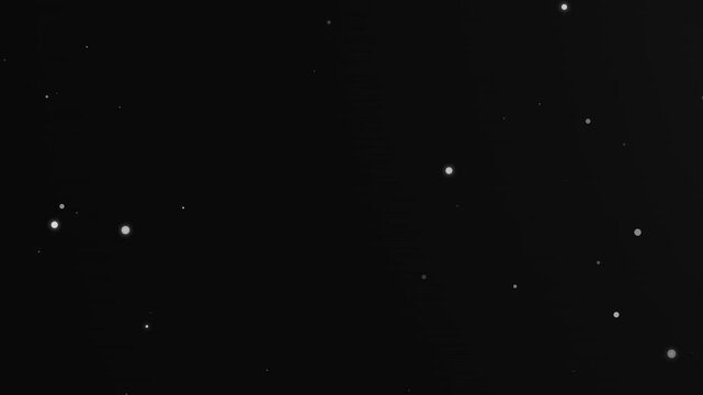 Abstract floating particles and dust motes shimmering in darkness, gentle movement, subtle bokeh effect for overlay or background
