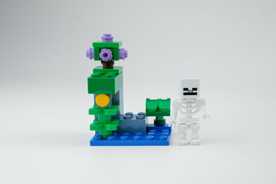 A Minecraft-style fantasy block structure is displayed beside a small skeleton toy figure on a white background on Apr 13, 2026 in Jakarta, Indonesia