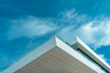 Modern Mediterranean architecture. White building cornice with glass balconies © Inspiraciones