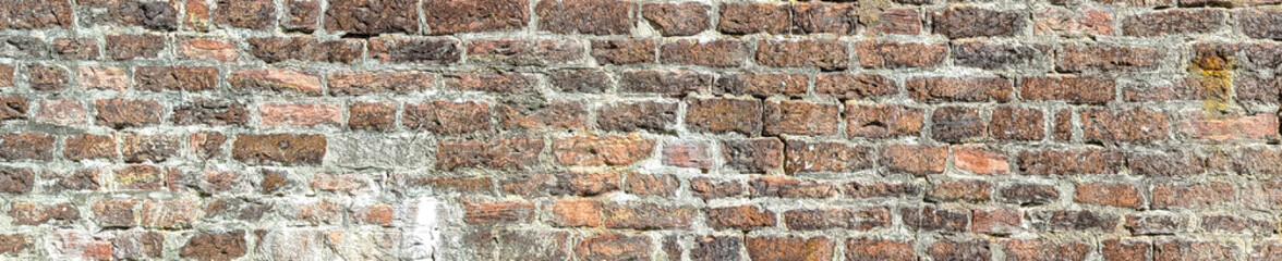 Fototapeta premium Old red brick wall texture panoramic background weathered ancient stone surface bannerKeywords (22 отдельных слова):