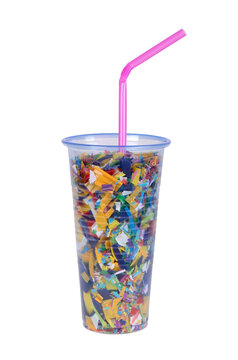 Plastic waste in a disposable plastic cup. Water containing microplastic concept 