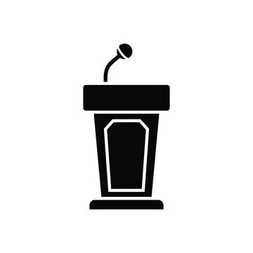 Black and white podium microphone icon.