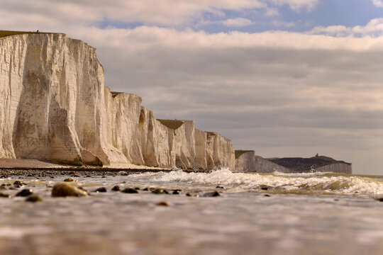 Beautiful chalk cliffs of Seven Sisters viewed from the water level on a sunny day
