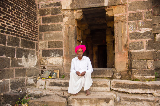 An Indian man prays at a Temple, India