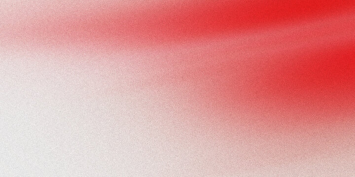Soft red gradient background with grainy texture and light haze for artistic backdrop use.