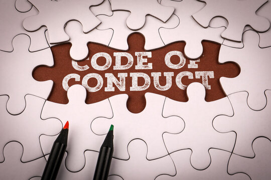 Code of Conduct Policy Presented Through Interlocking Puzzle Pieces as an Ethics Concept