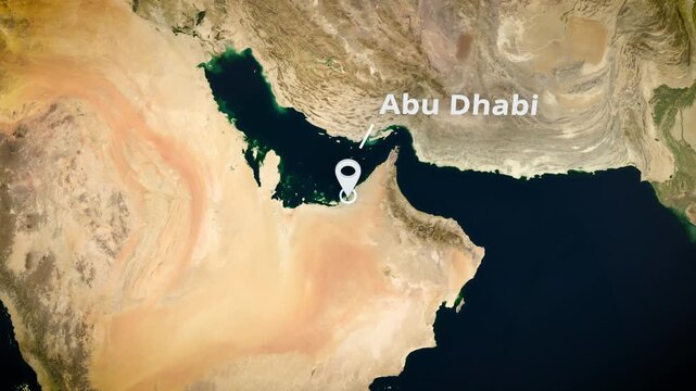 Satellite map view zooming to Abu Dhabi United Arab Emirates with a white location marker, perfect for educational travel documentaries and horizontal presentation graphics.