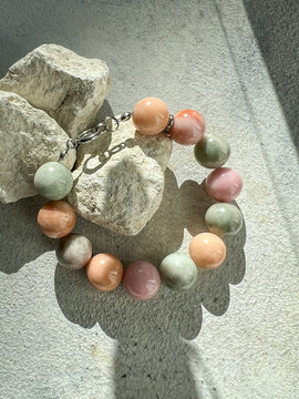 Gemstone bracelet in soft natural light. Handmade jewelry, fashion and beauty concept