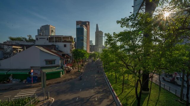 Daytime timelapse of city traffic on Vo Van Kiet street with skyscrapers in the background, Ho Chi Minh City, Vietnam.