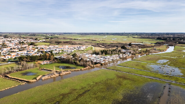 Aerial drone view of a flood zone along the Jaunay River near Givrand, France