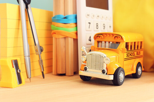 Back to school concept over pastel background. Top view