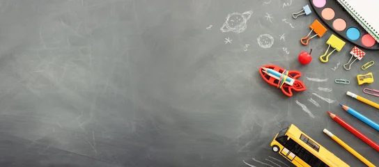 Back to school concept over classroom blackboard. Top view © tomertu
