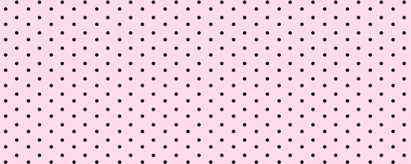 Seamless pink polkadot pattern with black dots. © Fatih