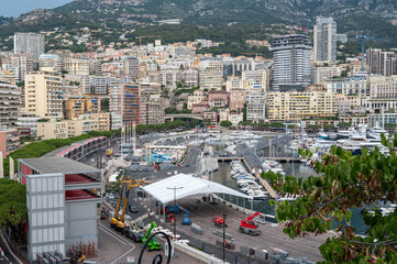Obraz premium Exclusive real estate development and luxury hillside residential apartments overlooking Port Hercules in Monte Carlo, Monaco