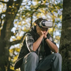 Man experiencing virtual reality outdoors in technology escape © Miljan Živković