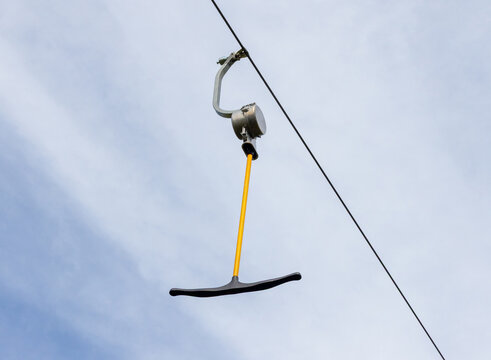 A T-bar ski lift (also known as a surface lift or drag lift). Spring-box surface lift