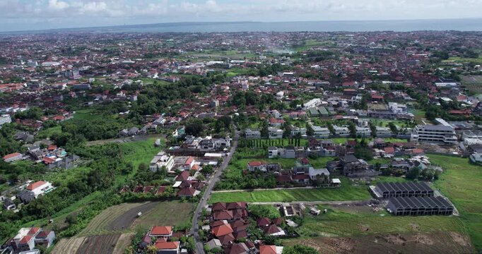 Bali faces challenges of population growth, water scarcity, and land loss due to increased tourism and rapid development