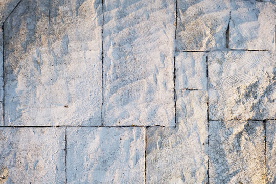 Natural stone wall texture with rectangular cut blocks and rough split-face surface. Durable masonry material ideal for wall cladding, architectural visualization, landscaping, and exterior background