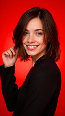 Fototapeta premium Radiant Smiling Woman with Bob Hair on Red Background