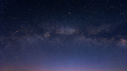 Fototapeta premium Milky Way galaxy with bright stars and meteor across night sky.