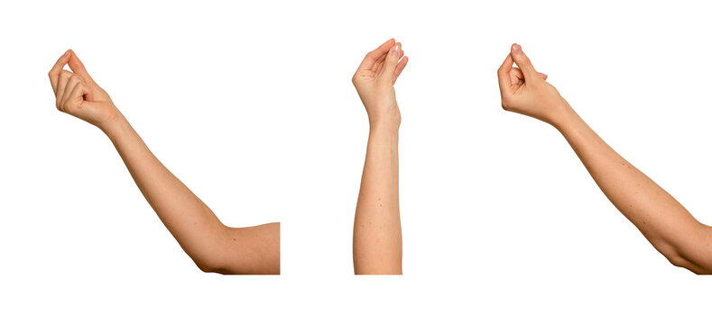 Female hand pinching thumb and index finger together. Delicate gesture as if holding something thin