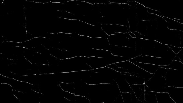 Animated Scratch Overlay Texture.Distressed white cracks on black background video effect.