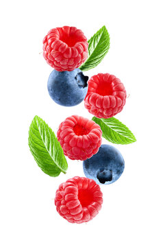 Levitate mix berries with mint leaves on white background