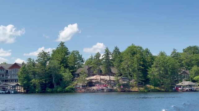 Boating on one of the Muskoka Lakes , Canada
