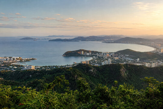 Elevated sunset view across Hainan bays and a coastal city surrounded by forest.generative AI