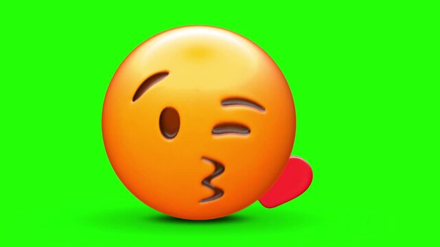 3D orange emoji face blowing a kiss with a small red heart icon, featuring a winking eye, puckered lips 4k stock animation video on a green screen for chroma key background in video editing.