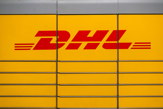Mannheim, Germany - May 14, 2026: 
Yellow DHL Packstation parcel locker located at railway station, modern automated delivery and pickup service infrastructure