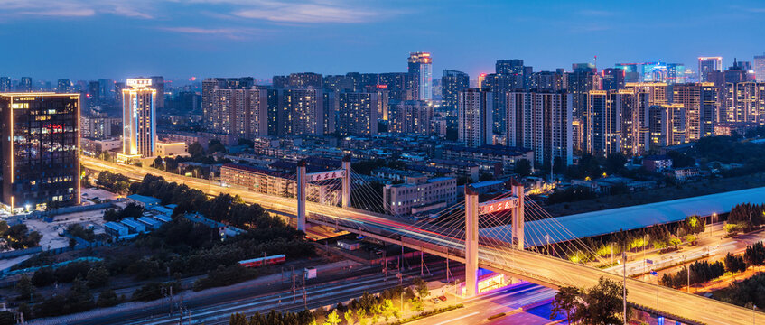 High angle night view of the city skyline at Huaian Bridge in Shijiazhuang, Hebei Province, China.