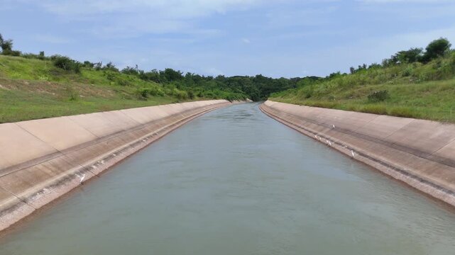 Large irrigation canals in rural Thailand are used to transport water for agriculture and for the daily needs of the people.