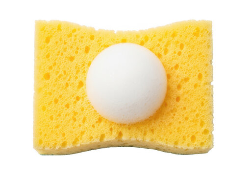 A yellow kitchen sponge with a round white foam ball placed on top for cleaning and washing