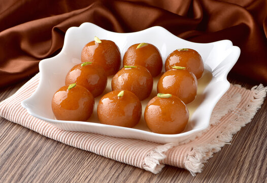 Gulab Jamun or Gulab Jaman is the highly popular sweet or dessert in Pakistan and Indian. 