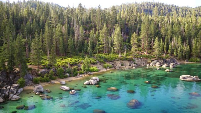Lake Tahoe - Aerial Pullback From Beautiful East Shore Beach with Clear Turquoise Waters and Dense Forest Trees