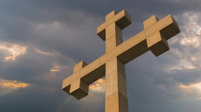 Timelapse: huge stone cross monument against moving clouds at sunrise, located on the mountain over Gonio town near Batumi, Georgia. Christianity, Orthodoxy, religion, spiritual and time lapse concept