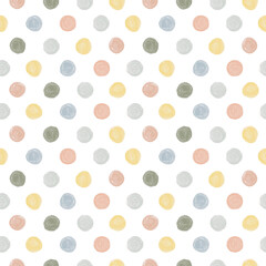 This cute, seamless pastel polka dot pattern features a delicate, handdrawn watercolor circle design for baby nursery wallpaper, fabric, and kids textile print © Karina Martirosova