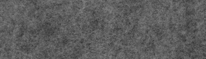 Gray felt texture with interwoven fibers and a uniform finish. High resolution textile background for design, decoration and graphic resources. © Larissa