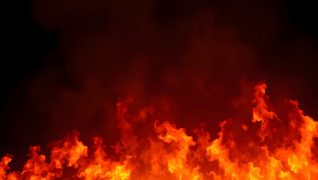 Vibrant roaring fire flames burning intensely against a dark background, dramatic hot blazing campfire texture