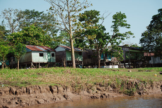  streets and wooden houses on the banks of the Amazon River.