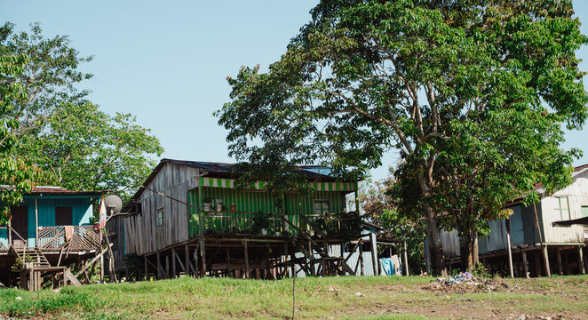  streets and wooden houses on the banks of the Amazon River.