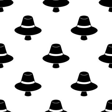 Seamless pattern with black hats, fedora, gentleman's accessory, classic headwear, retro fashion, elegant design.