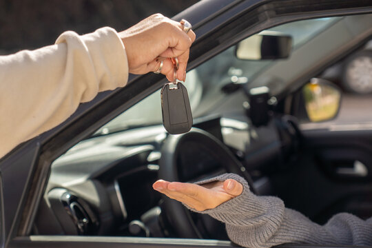 Handing over car keys to a new driver