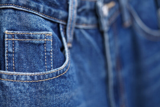  blue jeans. Front pocket and small pocket pants with seam of fashion design. close up, macro. concept business, shopping, sale. Design detail, button and seams, copy space