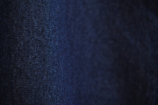 Blue denim jeans texture as background. close up, macro. concept business, shopping, sale. Design detail, copy space