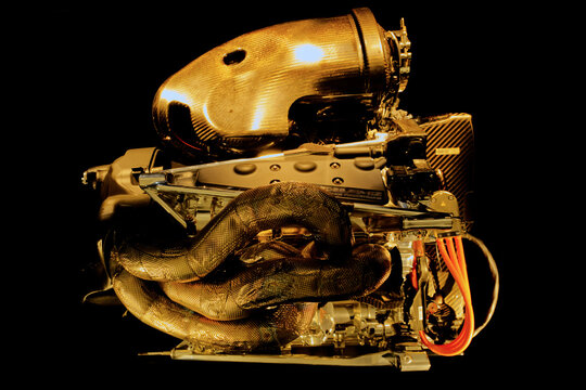High performance racing car hybrid engine with carbon fiber parts on black background